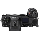 Top view of Nikon digital camera with control dials, LCD screen, and hot shoe mount